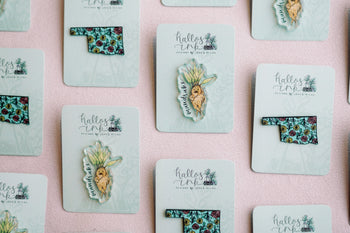 pins, keychains, & magnets image